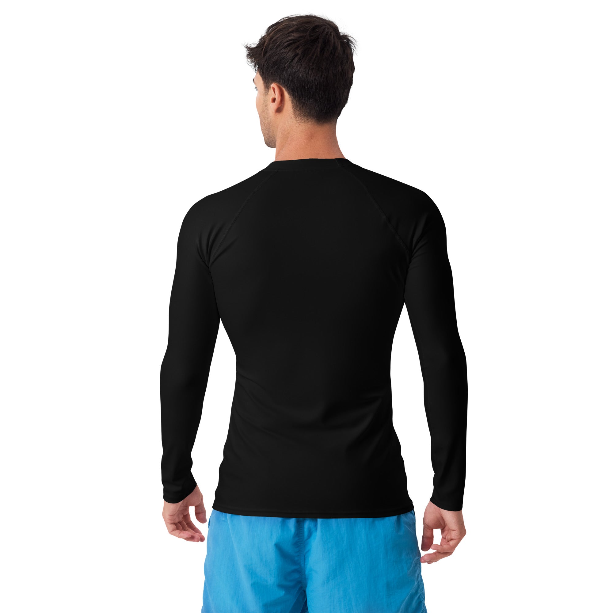 Person wearing a black long-sleeve shirt  standing against a white background.