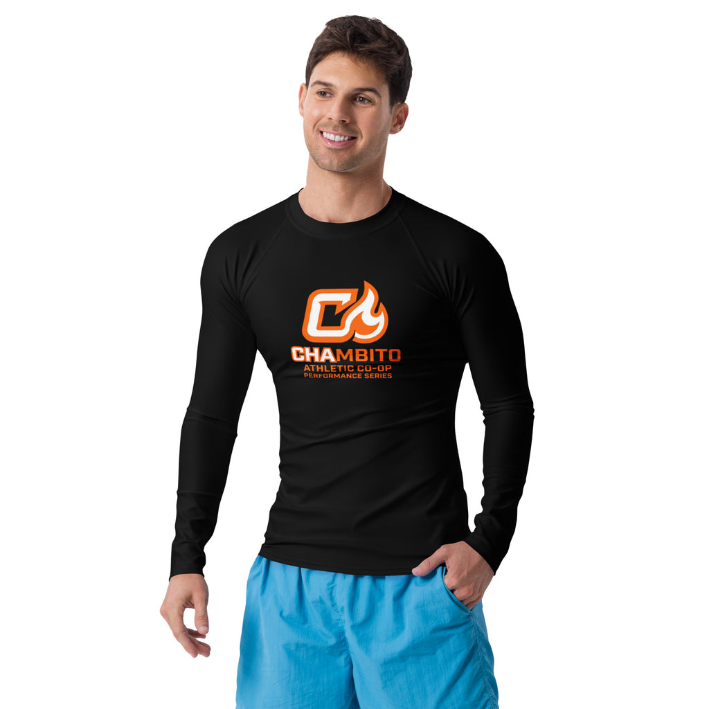 Man wearing a black long-sleeve shirt with a logo and blue shorts on a white background