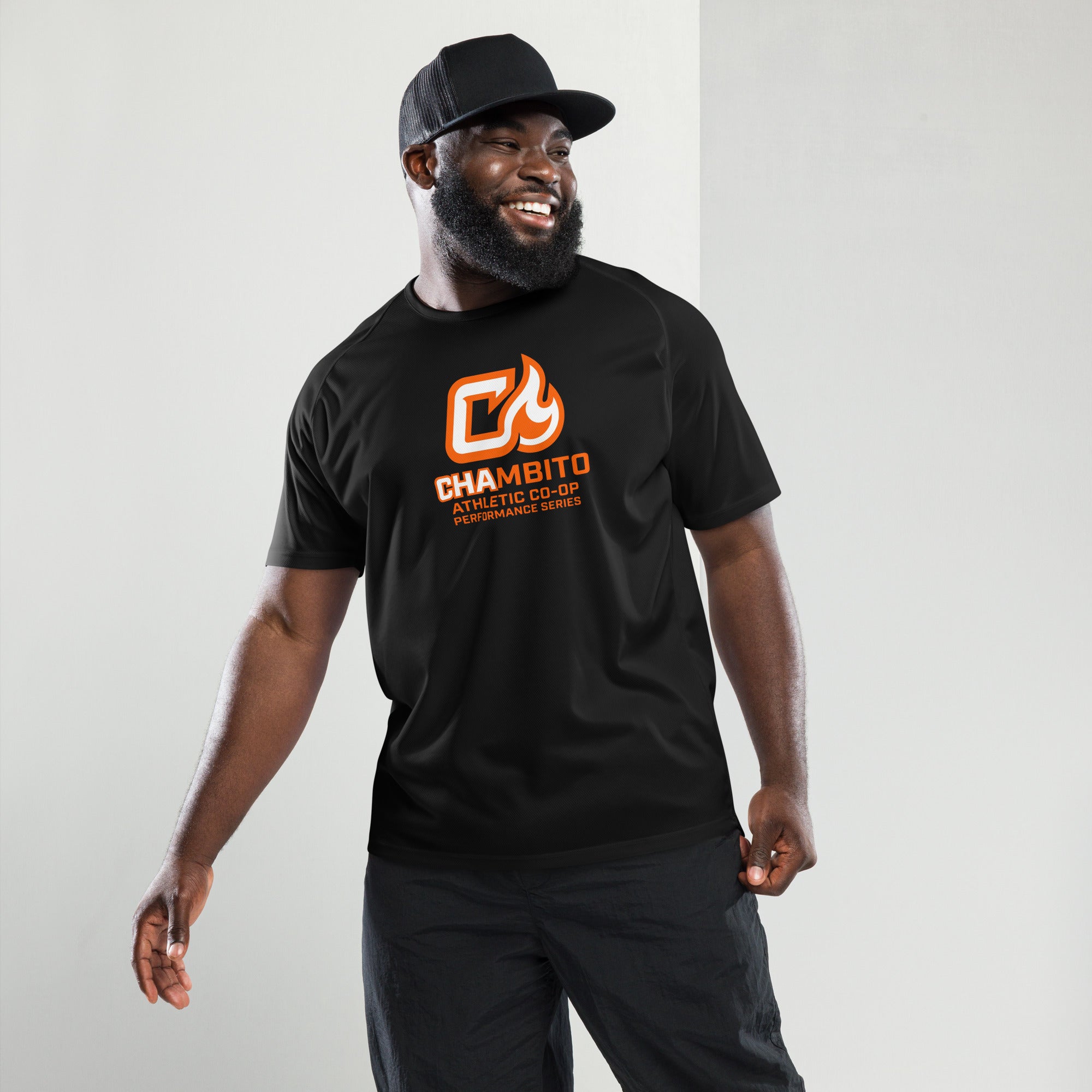 Man wearing a black t-shirt with a logo and text on a white background