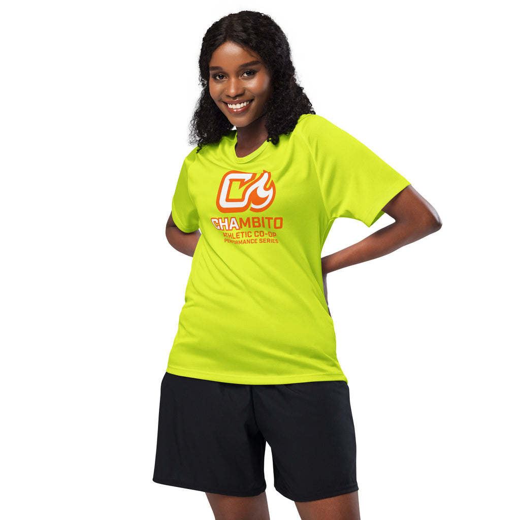 Woman wearing a bright green t-shirt with a logo and text, standing against a white background